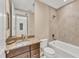 A bathroom featuring a bathtub, a toilet, and a vanity at 10520 Boardwalk Loop # 503, Bradenton, FL 34202