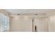 A spacious bedroom with a large window offering a scenic view at 10520 Boardwalk Loop # 503, Bradenton, FL 34202