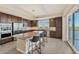 Contemporary kitchen with granite countertops, stainless steel appliances, and island with seating at 10520 Boardwalk Loop # 503, Bradenton, FL 34202