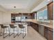 Modern kitchen with granite countertops, stainless steel appliances, and island with seating at 10520 Boardwalk Loop # 503, Bradenton, FL 34202