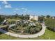 Aerial view of a lush community playground with ample seating and green space at 10520 Boardwalk Loop # 503, Bradenton, FL 34202