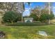 Manicured entrance sign for River Woods community amidst lush landscaping at 11551 30Th E Cv, Parrish, FL 34219