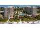 Stunning aerial view of the condos and walkway to the beach at 1211 Gulf Of Mexico Dr # 601, Longboat Key, FL 34228