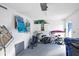 Organized garage space with bikes, beach chairs, and storage cabinets, offering ample room for equipment at 1239 Siesta Bayside Dr # 1239C, Sarasota, FL 34242