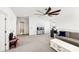 Spacious bonus room featuring a comfortable couch and contemporary decor at 12959 Seasong Ter, Bradenton, FL 34211