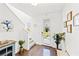 Inviting foyer with hardwood floors, stairs, and a bright entryway at 12959 Seasong Ter, Bradenton, FL 34211