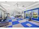 Gym featuring weight machines, treadmills and free weights with blue and grey pattern carpet at 12959 Seasong Ter, Bradenton, FL 34211