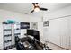 Office space equipped with monitors, comfortable chair, and display case at 12959 Seasong Ter, Bradenton, FL 34211