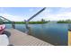 Private boat dock with boat lifts on the water offering convenient access for boating and water activities at 1410 San Jose Dr, Englewood, FL 34223