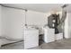 Practical laundry area with a washer, dryer, and utility sink at 1410 San Jose Dr, Englewood, FL 34223