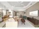 Spacious living room featuring neutral tones, modern decor, and an open-concept design at 15169 Vivaldi Dr, Nokomis, FL 34275