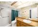 Well-maintained bathroom with a walk-in shower and vanity with plenty of counter space at 1525 Fleetwood Dr, Sarasota, FL 34232