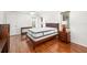 Bedroom boasts gleaming hardwood floors and two large windows at 1525 Fleetwood Dr, Sarasota, FL 34232