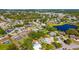 Aerial view of the community featuring homes with pools and peaceful waterways at 1525 Fleetwood Dr, Sarasota, FL 34232