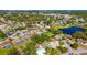 Aerial view of the community showcasing homes with pools surrounded by lush landscaping at 1525 Fleetwood Dr, Sarasota, FL 34232