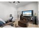 Bonus room with light walls, a tv and exercise equipment at 15508 Leven Links Pl, Lakewood Ranch, FL 34202
