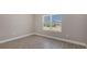 Cozy bedroom with natural light and tile flooring at 18137 Franklin Park Ct, Venice, FL 34293