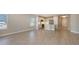 Bright kitchen features an island with stainless steel appliances and sink, with view of open area at 18137 Franklin Park Ct, Venice, FL 34293