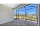 Screened patio area with brick flooring, perfect for enjoying the outdoors while staying protected at 18137 Franklin Park Ct, Venice, FL 34293