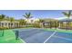 Tennis courts offer a scenic view of the community and provide an active recreational option at 18137 Franklin Park Ct, Venice, FL 34293