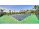 Outdoor tennis courts with lush greenery, providing an active recreational space for residents at 18137 Franklin Park Ct, Venice, FL 34293