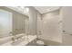 Bright bathroom featuring a double sink vanity with stone counters and a shower-tub combination at 18297 Vizcaya Ct, Venice, FL 34293
