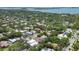 An elevated view of a beautiful neighborhood with large trees and waterfront access at 1879 Hibiscus St, Sarasota, FL 34239