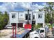 New home featuring modern architectural elements and a clean, minimalist aesthetic at 1879 Hibiscus St, Sarasota, FL 34239