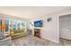 Inviting living room featuring comfortable sofa, natural light, and entertainment area at 22201 Olean Blvd, Port Charlotte, FL 33952