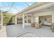 Spacious screened lanai with dining and seating area at 2311 Falcon Trace Ln, Nokomis, FL 34275