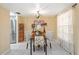 Dining room showcasing an inviting table setting with four chairs near a large window at 2347 Beneva Ter # 2251, Sarasota, FL 34232