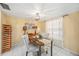 Dining room featuring a decorative chandelier, table with four chairs, and a wine rack at 2347 Beneva Ter # 2251, Sarasota, FL 34232