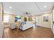 Bright living room with wood floors, ceiling fan, recessed lighting and sliding doors to the balcony at 2347 Beneva Ter # 2251, Sarasota, FL 34232