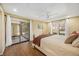 Spacious main bedroom with a view of a screened patio and natural light from multiple windows at 2347 Beneva Ter # 2251, Sarasota, FL 34232