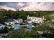 Aerial view of the estate highlighting its stately design and lush landscaping at 236 Saint James Park, Osprey, FL 34229
