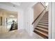 Inviting foyer features a staircase and entry to another living area at 236 Saint James Park, Osprey, FL 34229