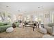 Bright living room with multiple seating options, offering a relaxing atmosphere at 236 Saint James Park, Osprey, FL 34229