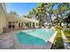 A beautiful backyard pool with a patio area perfect for entertaining guests on a sunny day at 236 Saint James Park, Osprey, FL 34229