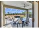 Relaxing lanai featuring a pool, comfortable seating, and scenic backyard views at 2871 Royal Palm Dr, North Port, FL 34288