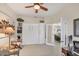 Versatile office space with built-in shelving, Murphy bed, and stylish furnishings at 2871 Royal Palm Dr, North Port, FL 34288