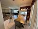 Dining room featuring tile flooring, traditional table and chairs and an open layout at 316 Orlando Blvd, Port Charlotte, FL 33954
