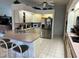 Spacious kitchen with ample countertop space, white cabinetry, and stainless steel appliances at 316 Orlando Blvd, Port Charlotte, FL 33954