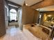 Beautiful bathroom showcasing a soaking tub, a large window and separate vanities at 316 Orlando Blvd, Port Charlotte, FL 33954