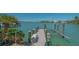 Well-maintained boat dock equipped with a boat lift for easy access to the open water at 316 W Royal Flamingo Dr, Sarasota, FL 34236
