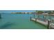 This beautiful waterfront home includes a private boat lift for easy access to the open water at 316 W Royal Flamingo Dr, Sarasota, FL 34236
