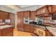 Chef's kitchen with stainless steel appliances, custom cabinetry, and a functional layout offers an elevated cooking experience at 316 W Royal Flamingo Dr, Sarasota, FL 34236