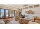 Bright living room with a waterfront view, comfortable seating, and stylish decor at 316 W Royal Flamingo Dr, Sarasota, FL 34236