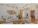 Bright living room featuring modern decor, hardwood floors, and neutral tones provides an inviting space at 316 W Royal Flamingo Dr, Sarasota, FL 34236