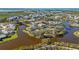 Wonderful aerial view of waterfront condos surrounded by mature trees and peaceful waterways in a desirable location at 321 108Th W St # 120, Bradenton, FL 34209