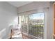 Inviting balcony provides a tranquil view of the lake and tropical greenery at 321 108Th W St # 120, Bradenton, FL 34209